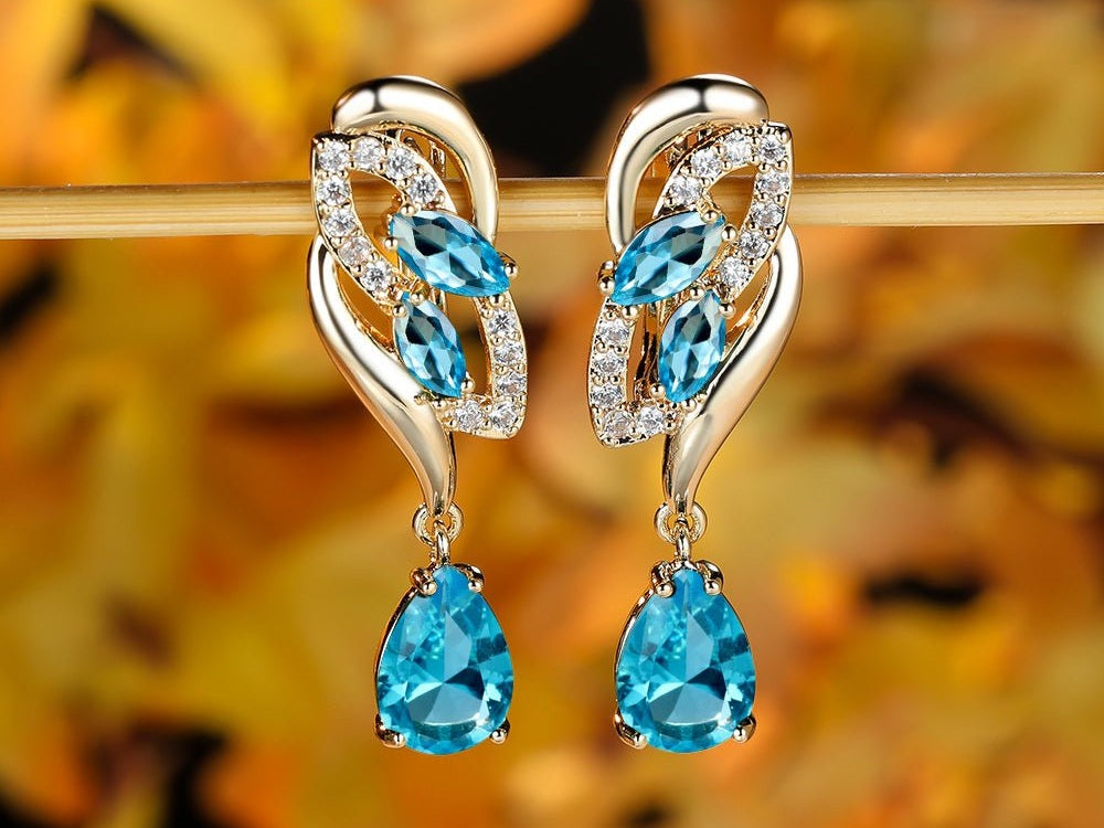 ANGOL Romantic Flower Dangle Earrings for Women - Golden - Tone Floral Design with Red & Clear Synthetic Gemstones, Elegant Party & Everyday Jewelry Gifts - Simply Just Deals LLCANGOL Romantic Flower Dangle Earrings for Women - Golden - Tone Floral Design with Red & Clear Synthetic Gemstones, Elegant Party & Everyday Jewelry Gifts23027Light BlueANGOL Romantic Flower Dangle Earrings for Women - Golden - Tone Floral Design with Red & Clear Synthetic Gemstones, Elegant Party & Everyday Jewelry Gift
