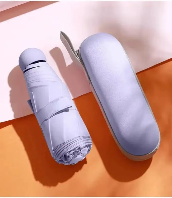 Capsule Umbrella Portable Mini Sunshade Sunscreen Rain Umbrella Black Rubber Alloy Handle Foldable Sun Rain Dual Use - Simply Just Deals LLCCapsule Umbrella Portable Mini Sunshade Sunscreen Rain Umbrella Black Rubber Alloy Handle Foldable Sun Rain Dual Use8a311150-2c7a-4d95-9a88-8f04317b63c5PurpleCapsule Umbrella Portable Mini Sunshade Sunscreen Rain Umbrella Black Rubber Alloy Handle Foldable Sun Rain Dual Use