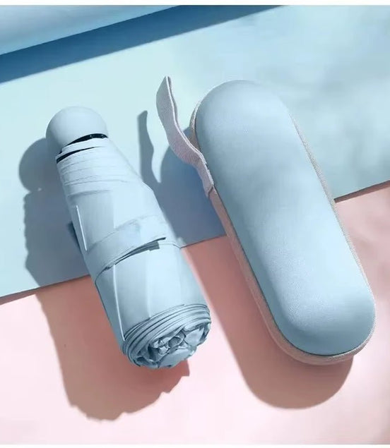 Capsule Umbrella Portable Mini Sunshade Sunscreen Rain Umbrella Black Rubber Alloy Handle Foldable Sun Rain Dual Use - Simply Just Deals LLCCapsule Umbrella Portable Mini Sunshade Sunscreen Rain Umbrella Black Rubber Alloy Handle Foldable Sun Rain Dual Use42b374b9-566a-4b14-89cd-8b3992f72fadSky BlueCapsule Umbrella Portable Mini Sunshade Sunscreen Rain Umbrella Black Rubber Alloy Handle Foldable Sun Rain Dual Use