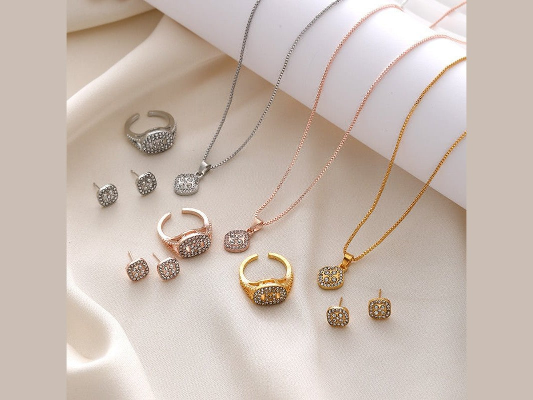 Diamond Geometric Necklace Ring Earrings 3 - piece Set - Simply Just Deals LLCDiamond Geometric Necklace Ring Earrings 3 - piece Set0CJLX210516201AZCK0106 GoldDiamond Geometric Necklace Ring Earrings 3 - piece Set