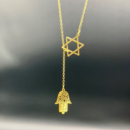 Star of David and Hamsa Drop Necklace - Simply Just Deals LLCStar of David and Hamsa Drop NecklaceJewelry Pendant Necklace42560115703831GoldThe Star of David and Hamsa Drop Necklace features a gold - plated Star of David pendant above a decorative Hamsa hand, both elegantly displayed against a blurred dark background.