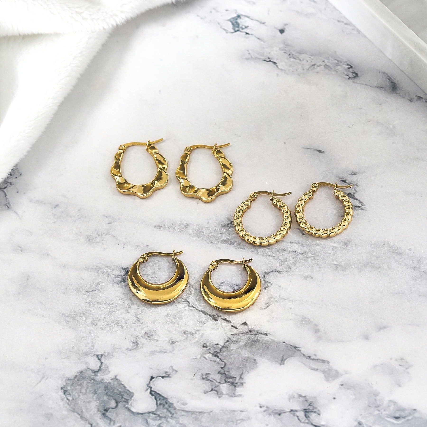 Twisted Hoop Earrings Set, Yellow Gold Plated, Hypoallergenic, 3 Pairs - Simply Just Deals LLCTwisted Hoop Earrings Set, Yellow Gold Plated, Hypoallergenic, 3 Pairs341e343c-26d0-49b8-ac85-8cd9f5dd54133 Pcs Set - 2Twisted Hoop Earrings Set, Yellow Gold Plated, Hypoallergenic, 3 Pairs